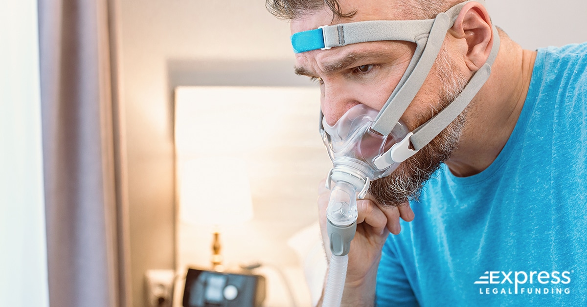 Man Using CPAP Machine