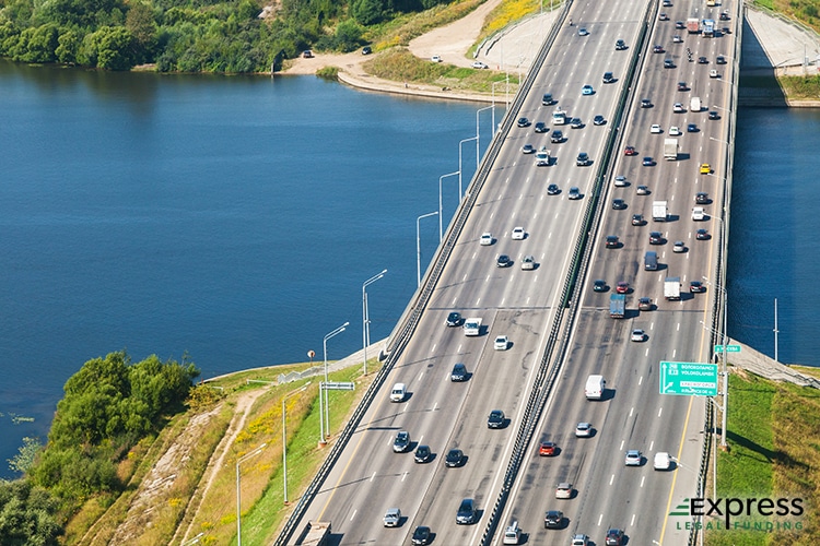 Vehicles Traveling Near Water