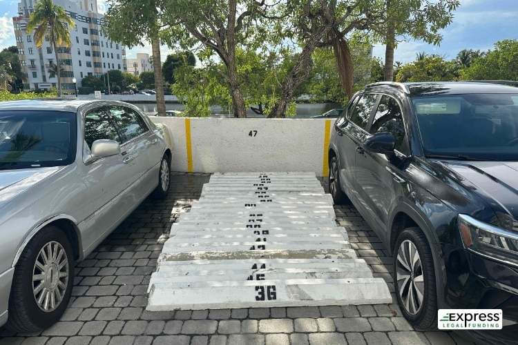 Multiple wheel stoppers in a parking space